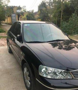 Cần bán Ford Laser MT đời 2004, màu đen