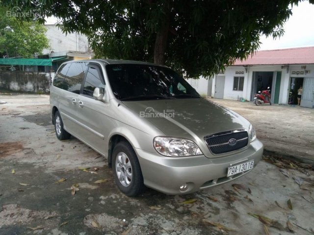 Bán xe Kia Carnival sản xuất 2009, màu bạc số tự động, 390 triệu