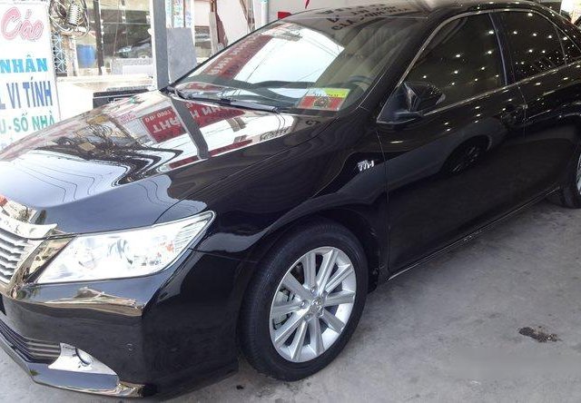 Bán Toyota Camry 2.4G 2014, màu đen 