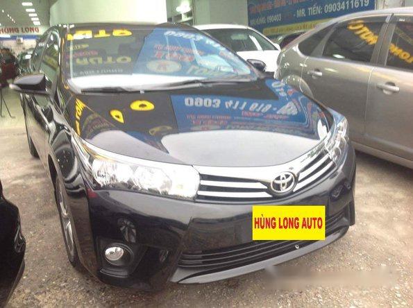 Cần bán xe cũ Toyota Corolla altis 1.8 AT đời 2015, màu đen