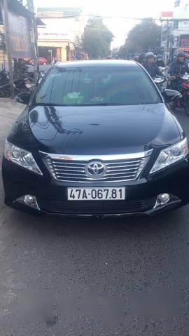 Bán Toyota Camry 2.0E năm 2013, màu đen