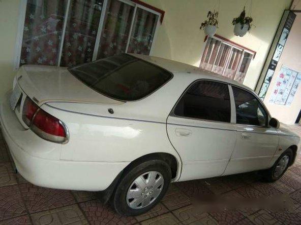 Bán nhanh xe Mazda 626 MT đời 1994, màu trắng số sàn