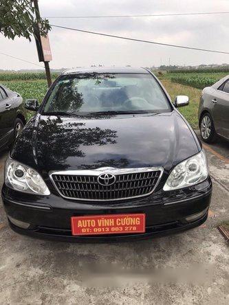 Bán xe cũ Toyota Camry 2.4G MT đời 2005, màu đen số sàn, 445 triệu