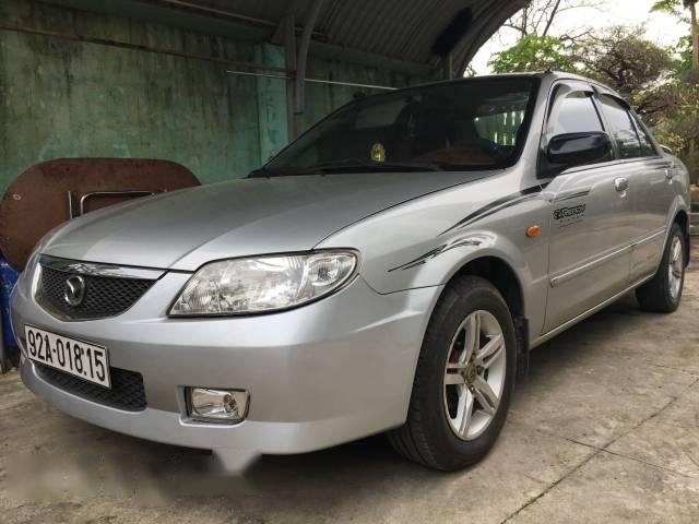 Cần bán xe cũ Mazda 323 đời 2004, màu bạc