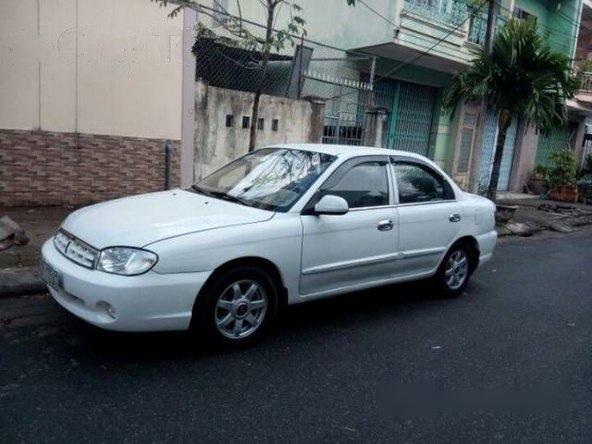 Bán xe Kia Spectra MT đời 2004, màu trắng số sàn, giá 145tr