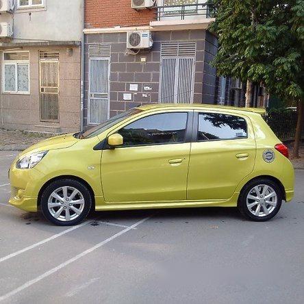 Cần bán xe Mitsubishi Mirage năm 2014, màu vàng, xe nhập, chính chủ, giá cạnh tranh