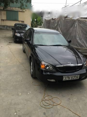 Cần bán gấp Daewoo Magnus đời 2007, màu đen số sàn, 156 triệu