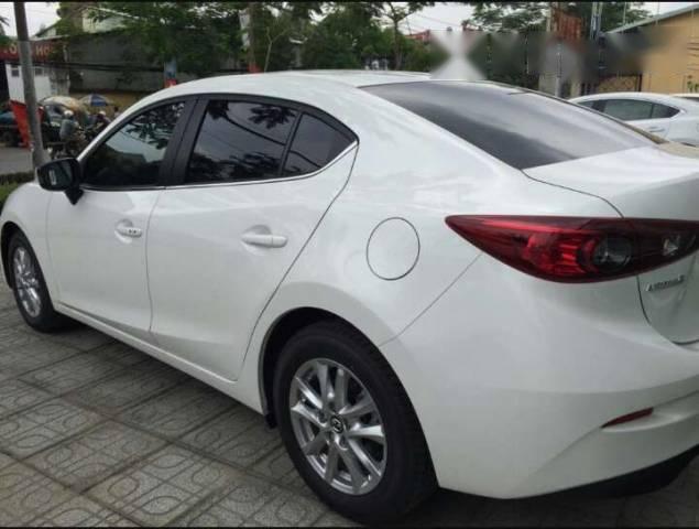 Cần bán gấp Mazda 3 đời 2015, màu trắng, giá chỉ 630 triệu