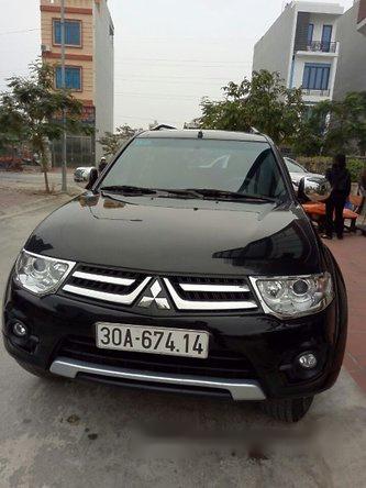 Bán xe Mitsubishi Pajero Sport đời 2015, màu đen số tự động