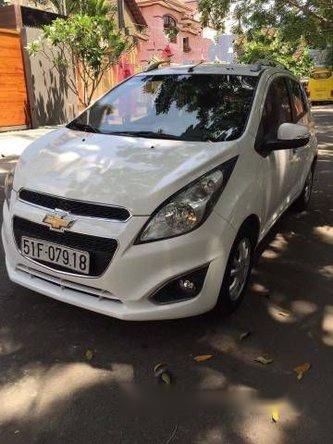 Mình cần bán xe Chevrolet Spark AT 2015, màu trắng