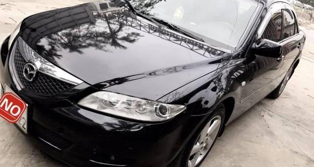 Bán xe Mazda 6 đời 2004, màu đen số sàn