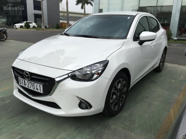 Bán xe Mazda 2 1.5L màu trắng, xe mới 100%, hỗ trợ vay đến 80% giá trị xe, liên hệ Mr. Thông - 0937299026