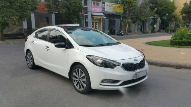 Cần bán xe cũ Kia K3 1.6 đời 2013, màu trắng số tự động