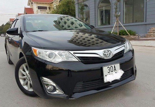 Gia đình bán Toyota Camry đời 2014, màu đen, xe nhập
