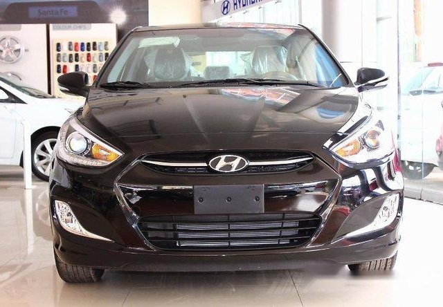 Bán Hyundai Accent 1.4 MT đời 2016, màu đen, giá tốt