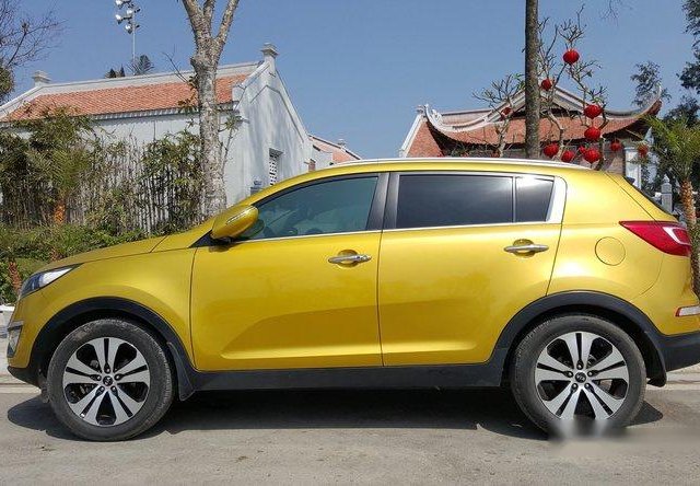 Cần bán Kia Sportage đời 2011, màu vàng số tự động