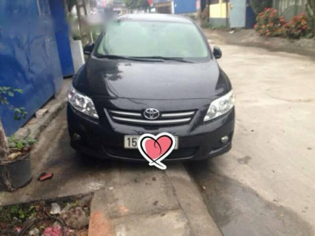 Gia đình bán xe Toyota Corolla altis đời 2010, màu đen 