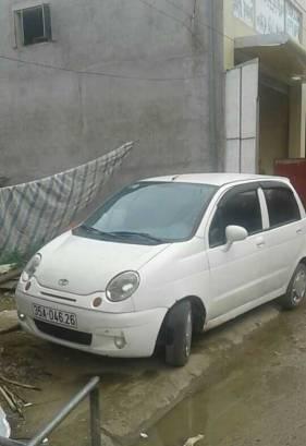 Gia đình cần bán Daewoo Matiz đời 2004, màu trắng 