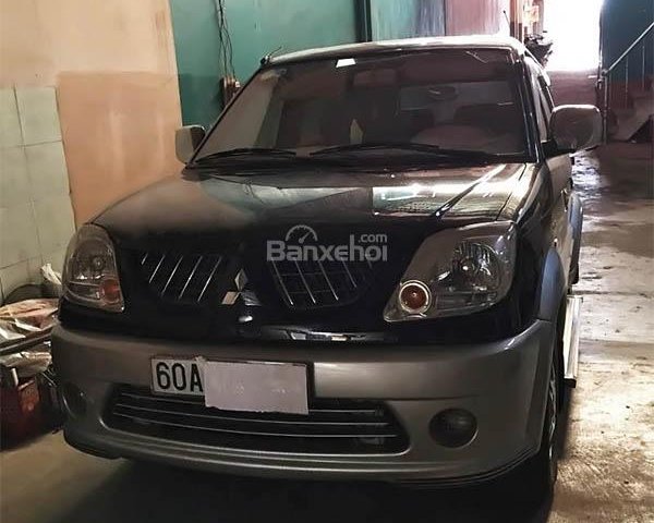 Cần bán xe Mitsubishi Jolie SS đời 2005, màu đen xe gia đình