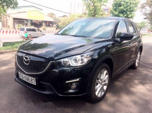 Cần bán gấp Mazda CX 5 đời 2014, màu đen xe gia đình giá cạnh tranh