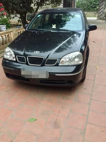 Chính chủ bán Daewoo Lacetti đời 2006, màu xanh đen