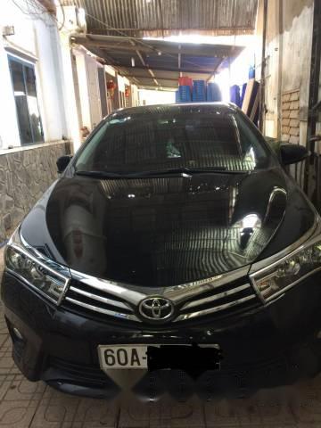 Cần bán gấp Toyota Corolla Altis 1.8 đời 2015, màu đen, xe đẹp