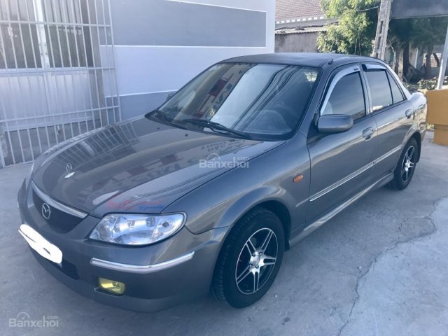 Cần bán xe Mazda 323 2003, màu xám (ghi), nhập khẩu nguyên chiếc