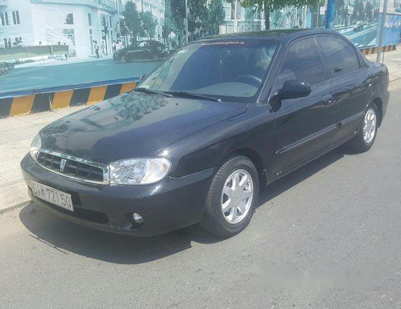 Bán xe cũ Kia Spectra đời 2004, màu đen số sàn