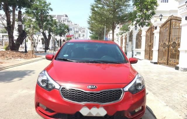 Cần bán xe Kia K3 2.0AT, sản xuất 2014, màu đỏ, số tự động, biển Sài Gòn