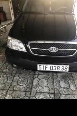 Gia đình bán xe Kia Carnival 2009, màu đen