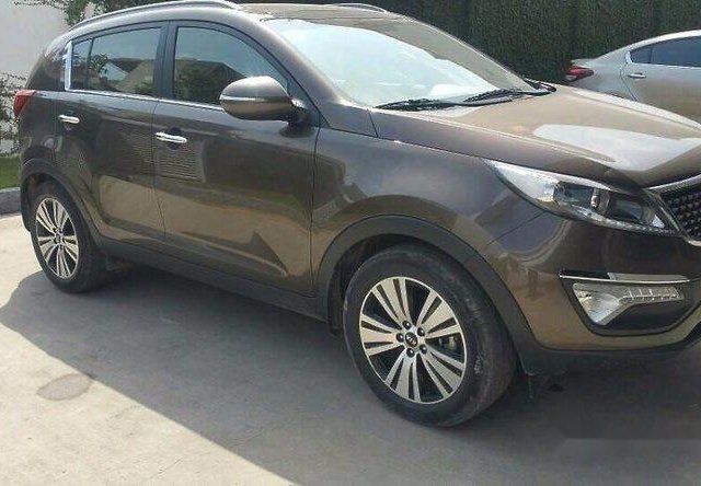 Bán Kia Sportage đời 2014, màu nâu chính chủ, giá 740tr