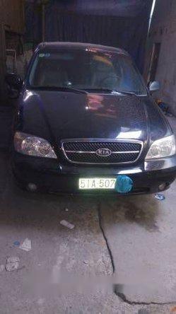 Bán xe cũ Kia Carnival MT đời 2007, màu đen, giá bán 215 triệu