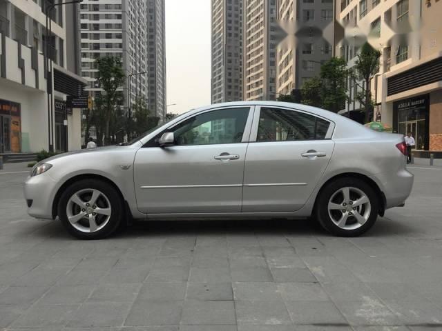 Cần bán xe Mazda 3 AT 1.6 Sport đời 2005, màu bạc như mới