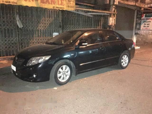 Chính chủ bán xe Toyota Corolla altis đời 2009, màu đen