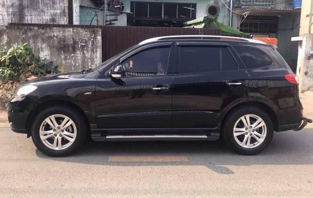 Cần bán gấp Hyundai Santa Fe SLX đời 2010, màu đen số tự động