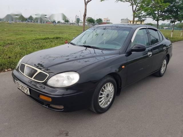 Cần bán Daewoo Leganza đời 1997, màu đen, giá chỉ 92 triệu