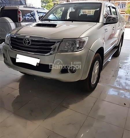 Bán Toyota Hilux 3.0 đời 2014, màu bạc, nhập khẩu chính hãng số sàn