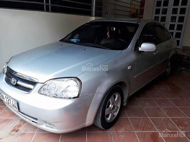 Bán xe Chevrolet Lacetti EX đời 2011, màu bạc xe gia đình