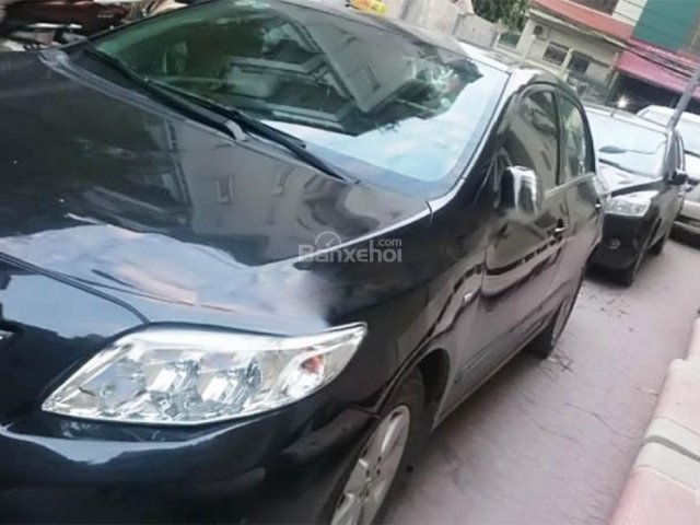 Bán xe cũ Toyota Corolla Altis 1.8AT đời 2009, màu đen số tự động, giá tốt