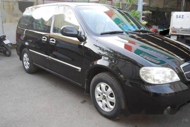 Chính chủ bán Kia Carnival AT đời 2009, màu đen, giá chỉ 320 triệu