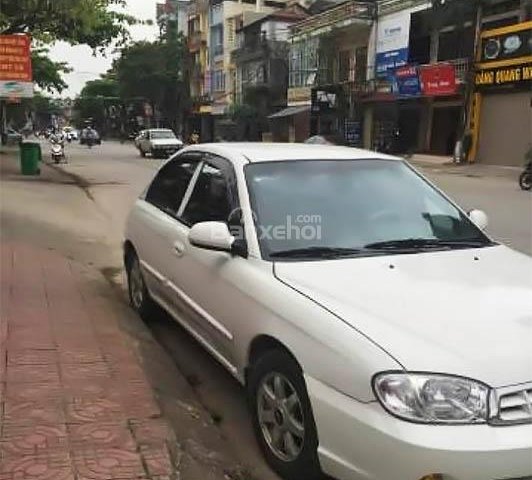 Cần bán xe Kia Spectra LS sản xuất 2004, màu trắng, giá 125tr