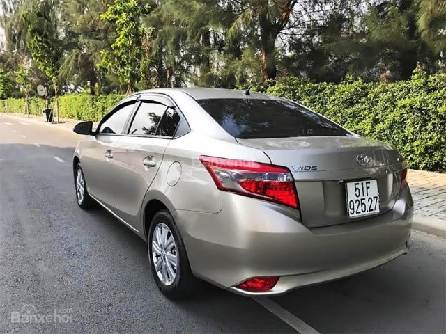 Bán xe Toyota Vios 1.5AT đời 2016, màu vàng