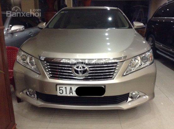 Bán Toyota Camry LE đời 2013, màu vàng, nhập khẩu nguyên chiếc