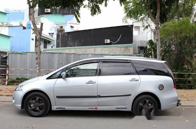 Cần bán gấp Mitsubishi Grandis đời 2005, màu bạc đã đi 90000 km, 390tr