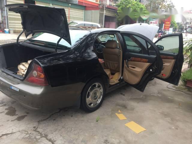 Bán Daewoo Magnus năm 2004, màu đen, giá bán 255 triệu