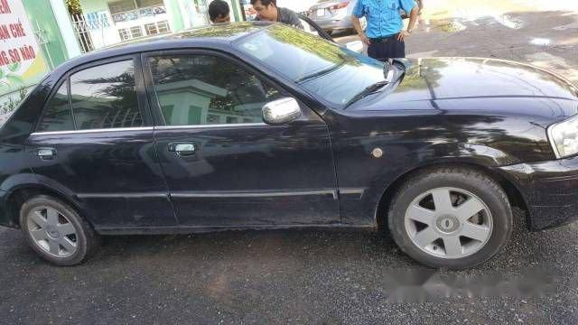 Chính chủ bán Ford Laser MT đời 2002, màu đen