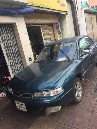 Cần bán Mazda 626 năm 1993, màu xanh lam đã đi 294000 km