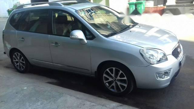 Cần bán Kia Carens màu bạc, số tự động, Sx 2011 Đk 15/12/2011