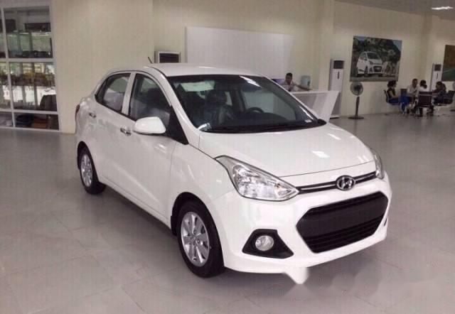 Cần bán Hyundai Grand i10 1.2 MT đời 2015, xe mới 100%