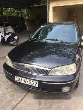 Bán xe cũ Ford Laser MT đời 2003, màu đen chính chủ, 235tr